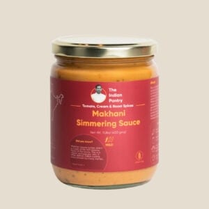 Indian pantry Makhani simmering sauce with tomato, cream, and spices for rich Indian flavor. Perfect for curries and popular Indian dishes. Gluten-free, mild heat.