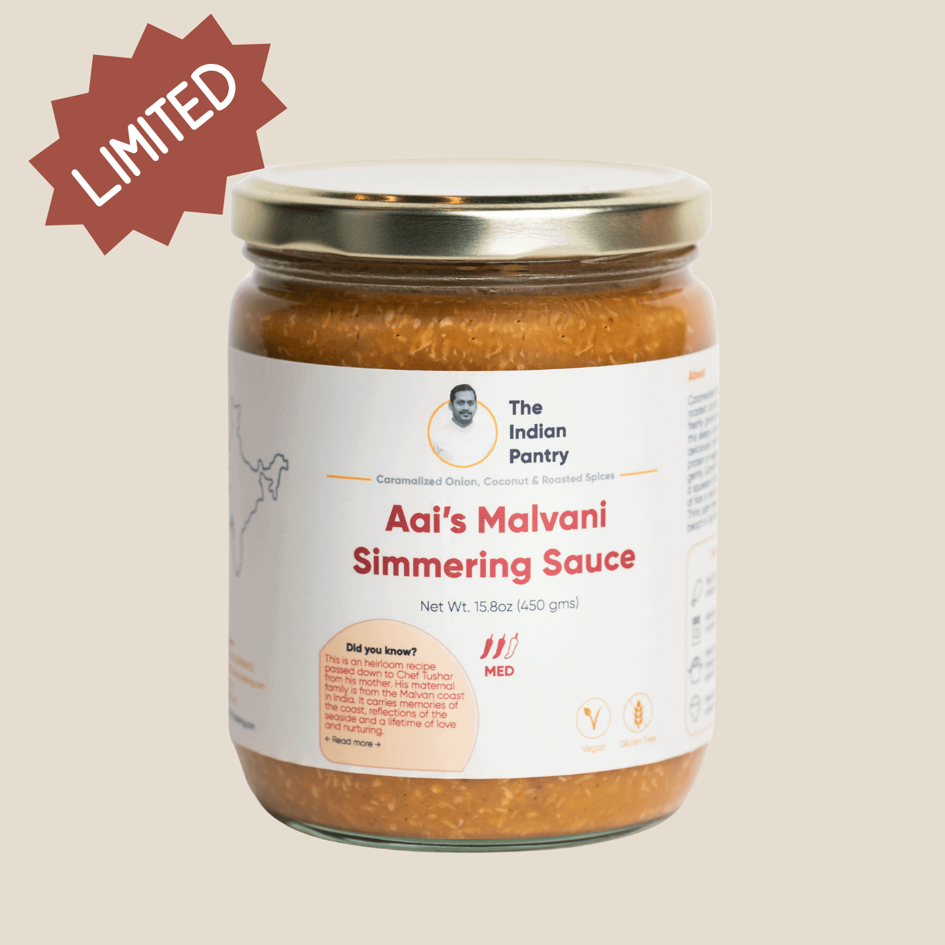 Vegan, gluten-free, authentic Indian cooking sauce with caramelized onion, coconut, and roasted spices in a glass jar. Limited edition flavorful Malvani cuisine condiment.