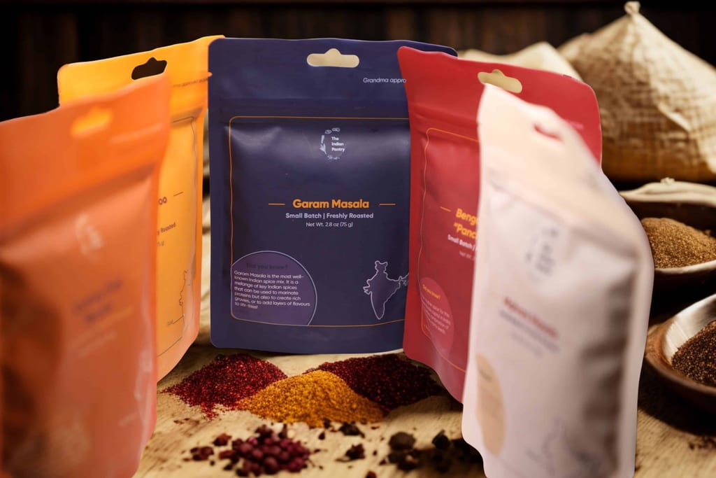 High-quality Indian spices including garam masala and benegal "pran" blend, in resealable packaging for fresh flavor. Perfect for authentic Indian cooking and marinating dishes.